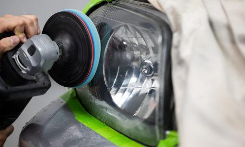 Person,Polishing,A,Dull,Car,Headlight,For,Restoration,,Improving,Visibility