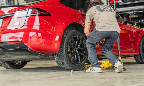 duggy's garage mechanic doing tesla service and repairs