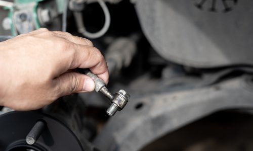 Technician,Remove,Brake,Hose,From,Brake,Caliper,Of,The,Car