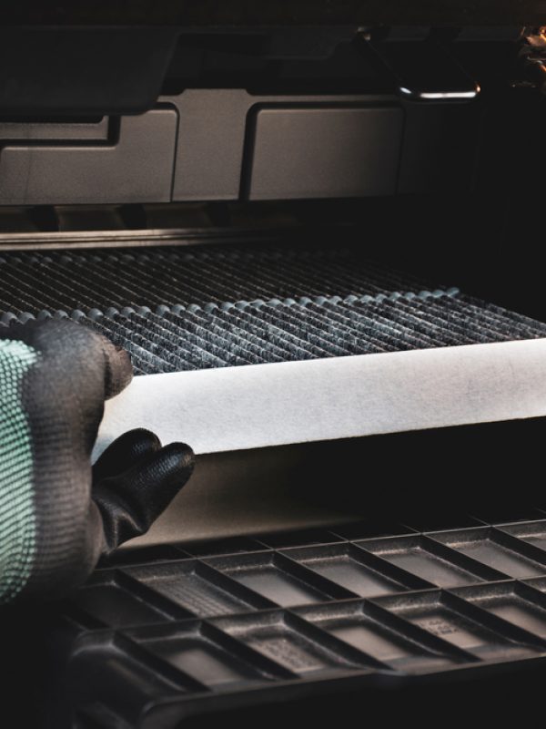 Taking out dusty cabin air filter